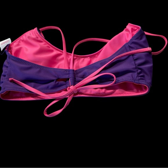 A No Boundries bikini that is reversible and can be pink or purple or a combo - Picture 10 of 10